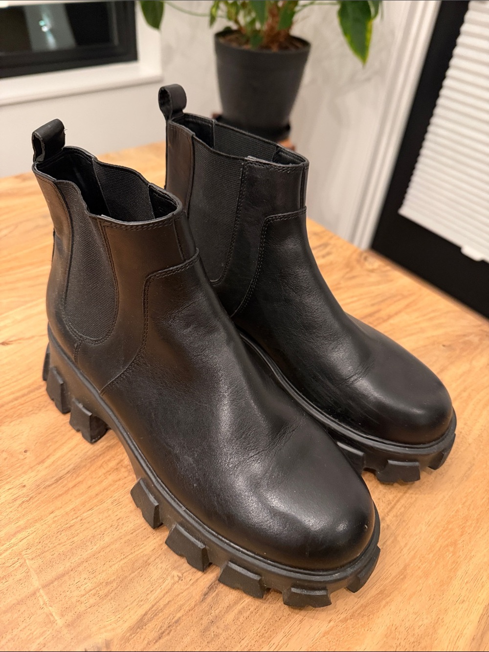 Black Leather Lug-Soled Chelsea Boots